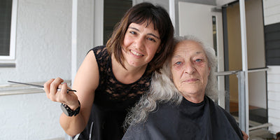 Haircut and a chat giving Inala Family Support Centre clients new outlook on life